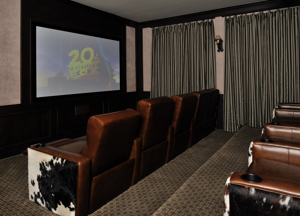 Home theater - large traditional enclosed carpeted home theater idea in Houston with a projector screen and beige walls