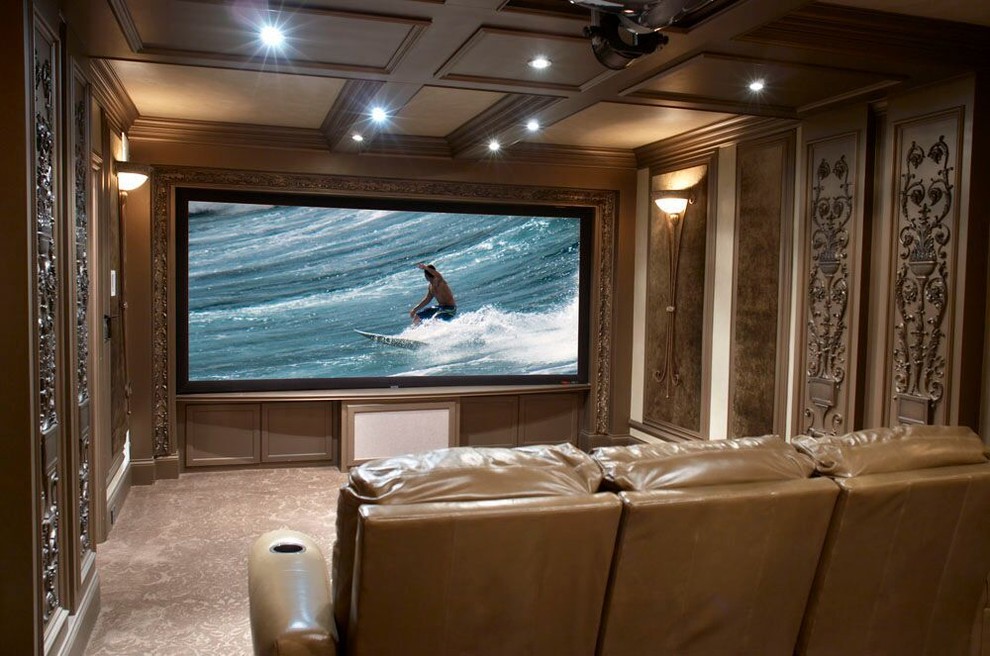 Inspiration for a medium sized traditional enclosed home cinema in Orange County with brown walls, carpet, a projector screen and brown floors.