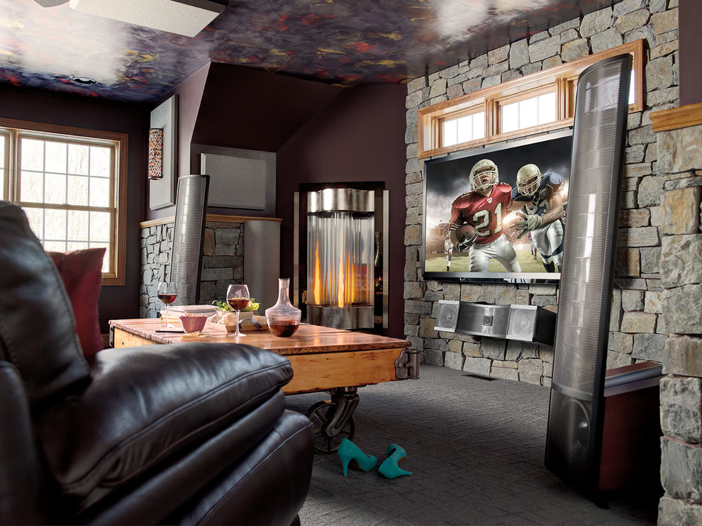Example of a mid-sized arts and crafts enclosed carpeted home theater design in Minneapolis with multicolored walls and a wall-mounted tv
