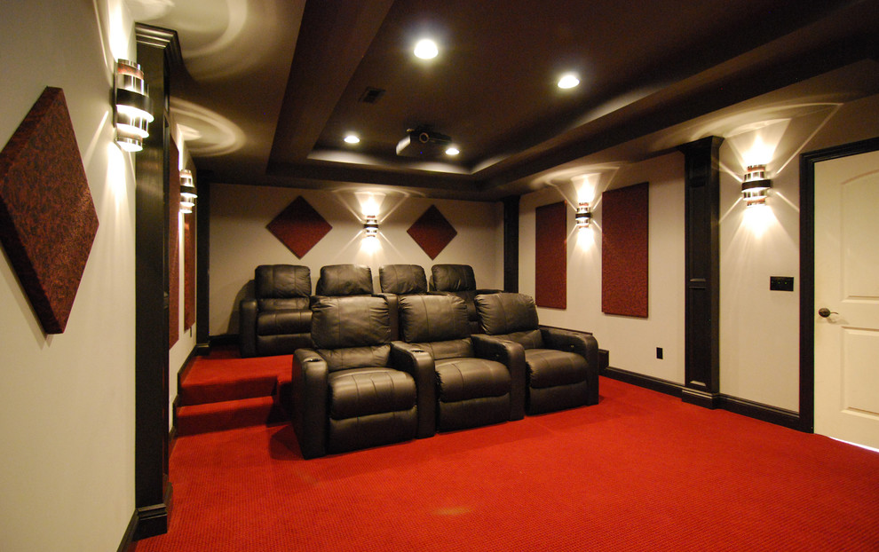 Ejemplo de cine en casa cerrado moderno grande con pantalla de proyección