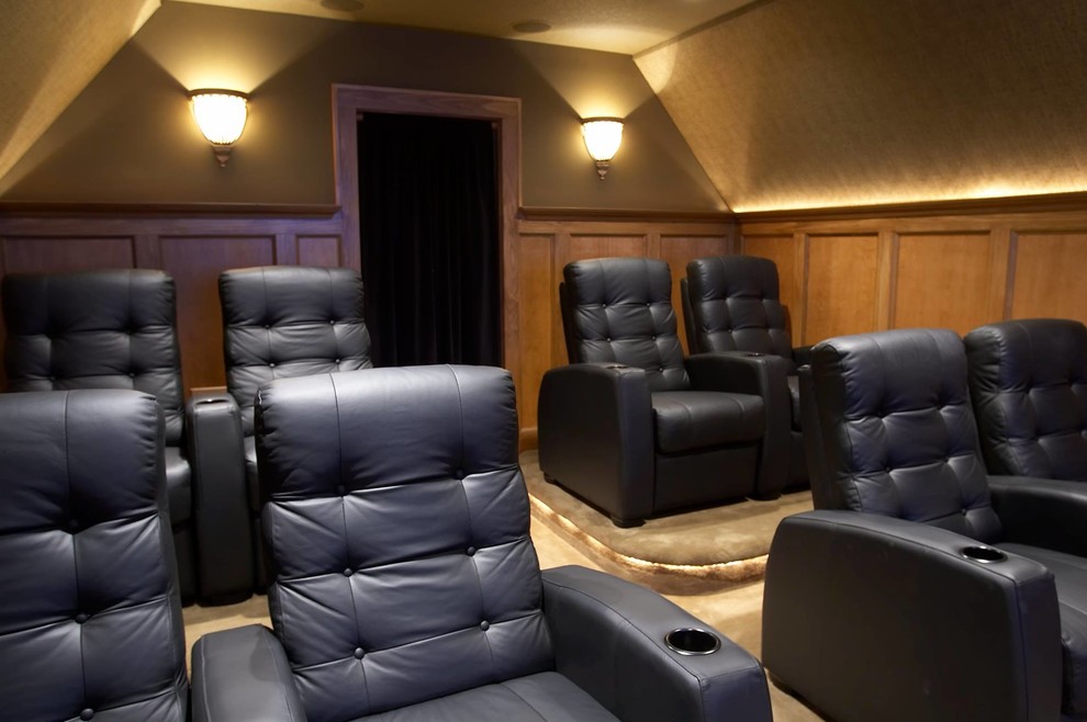 Mid-sized elegant enclosed carpeted home theater photo in Chicago with beige walls and a projector screen