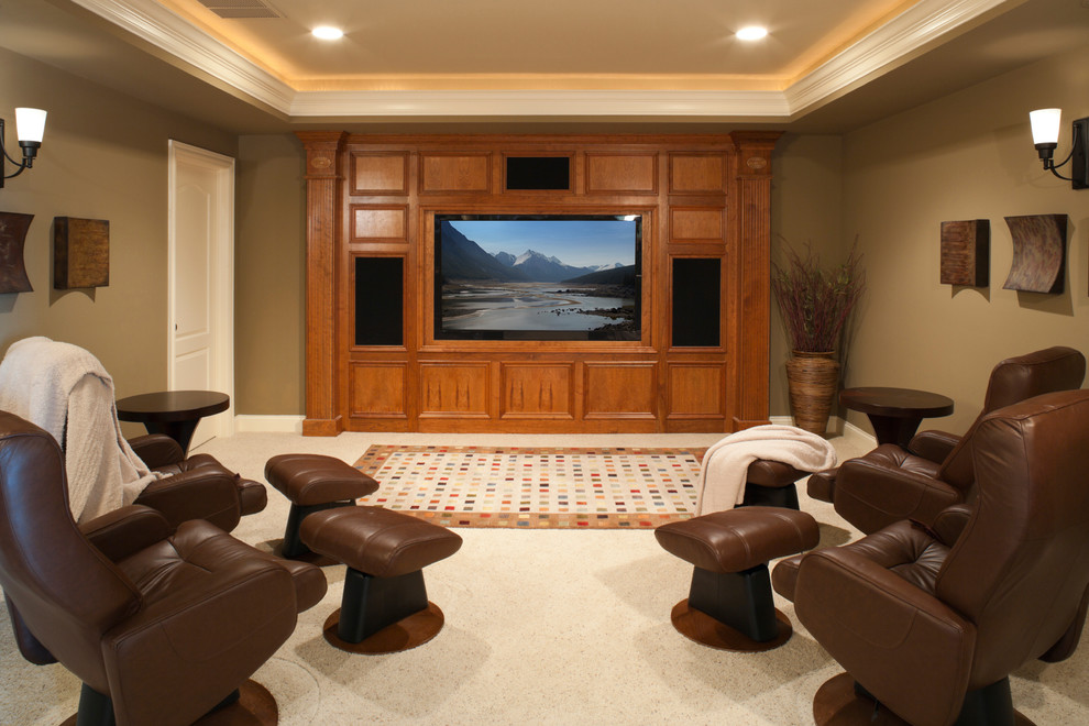 Example of a mid-sized mountain style open concept carpeted and white floor home theater design in Denver with a media wall and beige walls