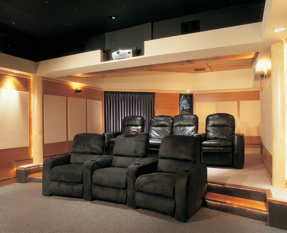Large elegant enclosed carpeted home theater photo in Philadelphia with beige walls and a media wall