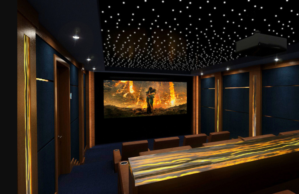 Пример оригинального дизайна: большой изолированный домашний кинотеатр в современном стиле с синими стенами, ковровым покрытием, проектором и синим полом