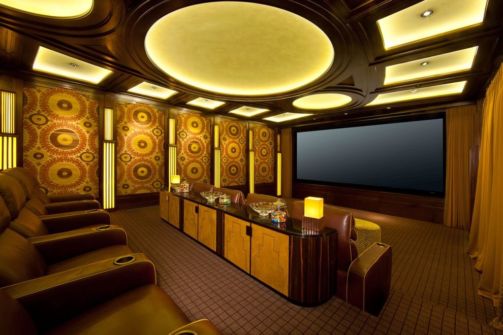 Home theater - eclectic home theater idea in Los Angeles with a projector screen