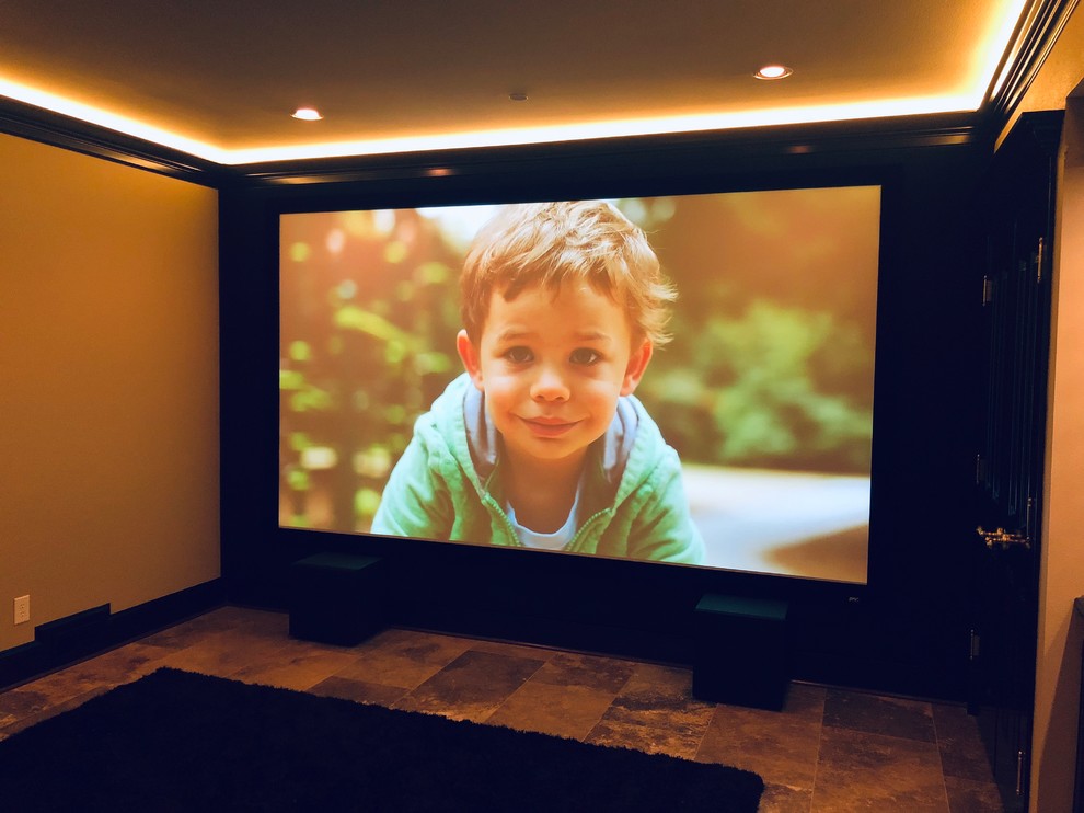 Inspiration for a large traditional enclosed home cinema in Seattle with ceramic flooring and a projector screen.