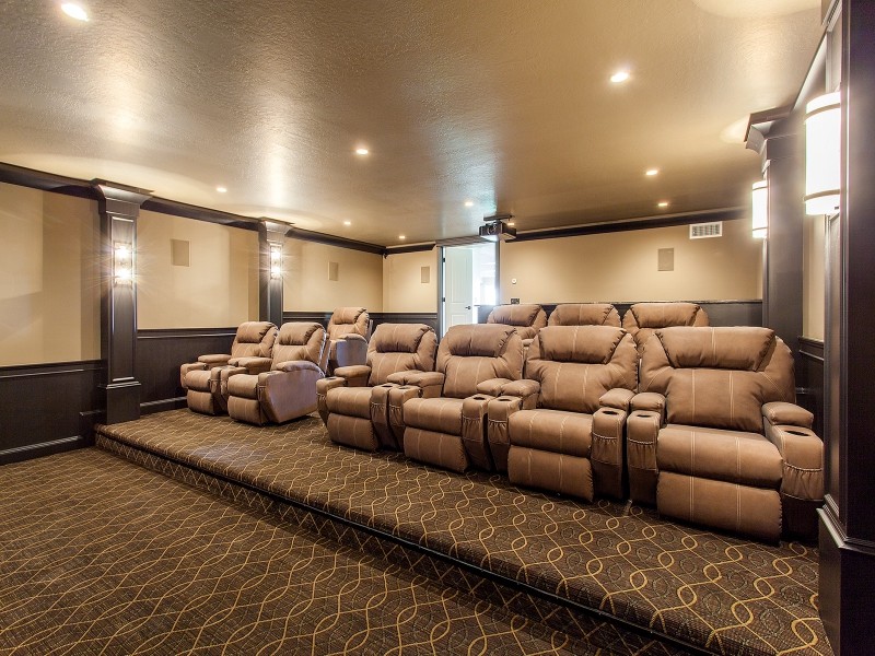 Example of a large arts and crafts open concept home theater design in Salt Lake City