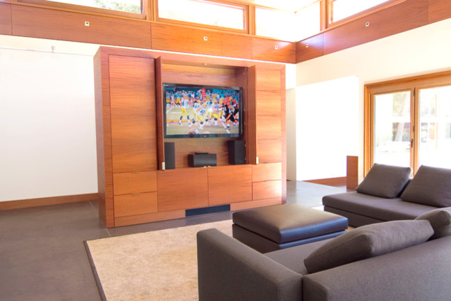 This is an example of a contemporary home cinema in San Francisco.