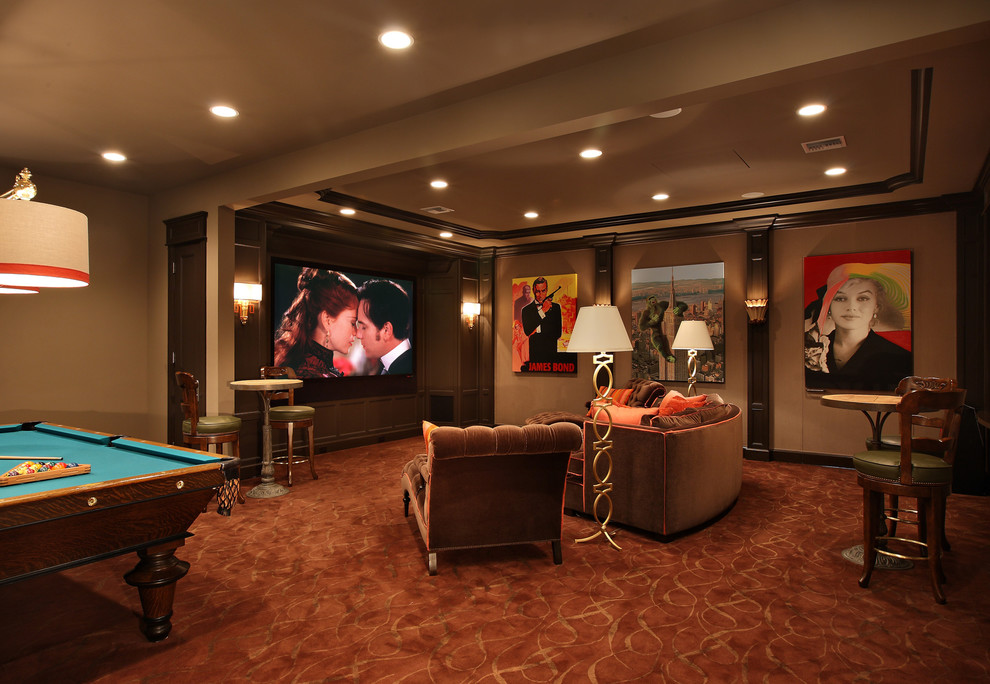 Photo of a large traditional enclosed home cinema in Houston with beige walls, carpet and a built-in media unit.