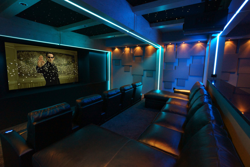 Large traditional enclosed home cinema in Baltimore with carpet and a projector screen.