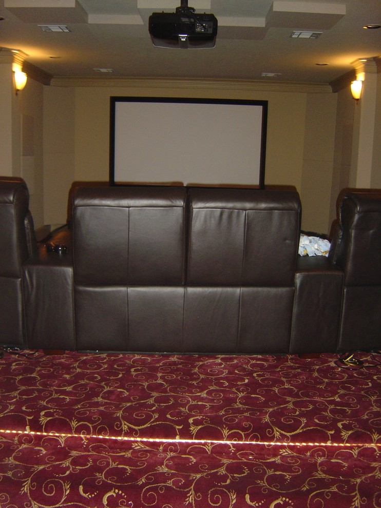 Inspiration for a mediterranean home theater remodel in Houston
