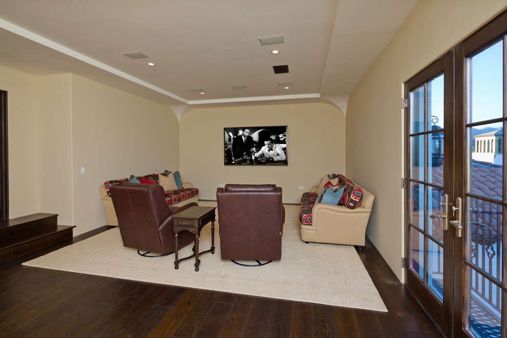 Example of a tuscan home theater design in Los Angeles