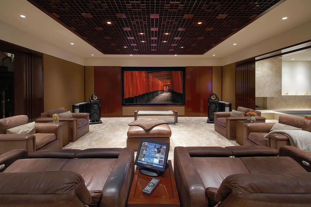 Large trendy open concept carpeted home theater photo in Salt Lake City with beige walls and a wall-mounted tv