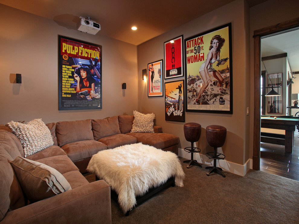 Inspiration for a medium sized rustic enclosed home cinema in Atlanta with beige walls, carpet and a projector screen.