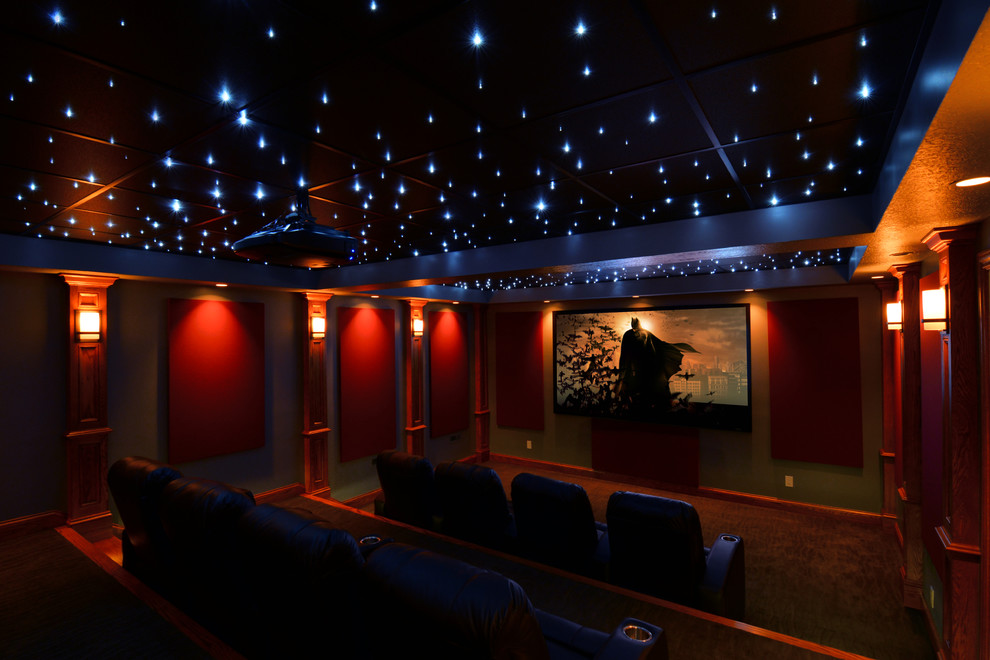 Design ideas for a large modern enclosed home cinema in Cleveland with a projector screen.