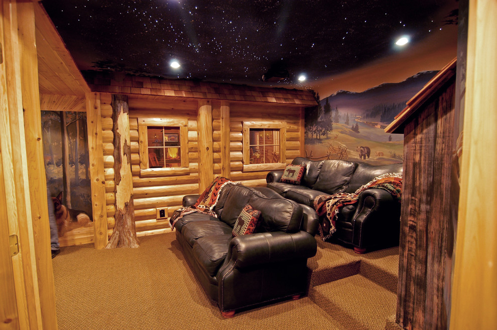 Example of a large mountain style enclosed carpeted home theater design in Dallas with beige walls and a projector screen