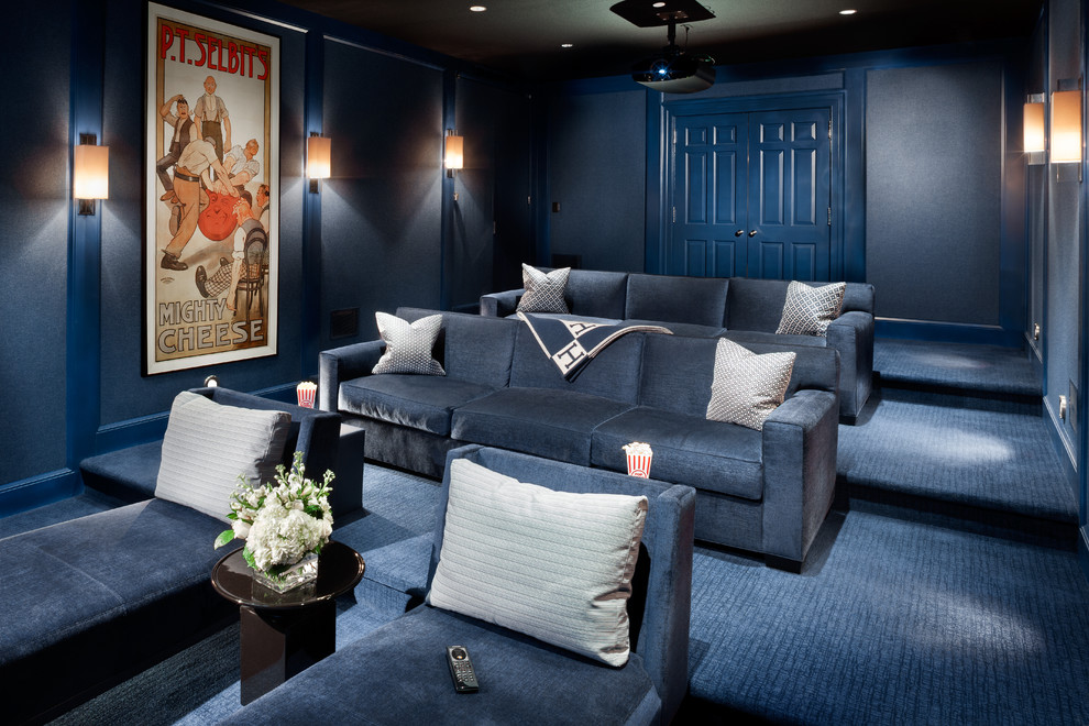 На фото: большой изолированный домашний кинотеатр в стиле неоклассика (современная классика) с синими стенами, ковровым покрытием, проектором и синим полом