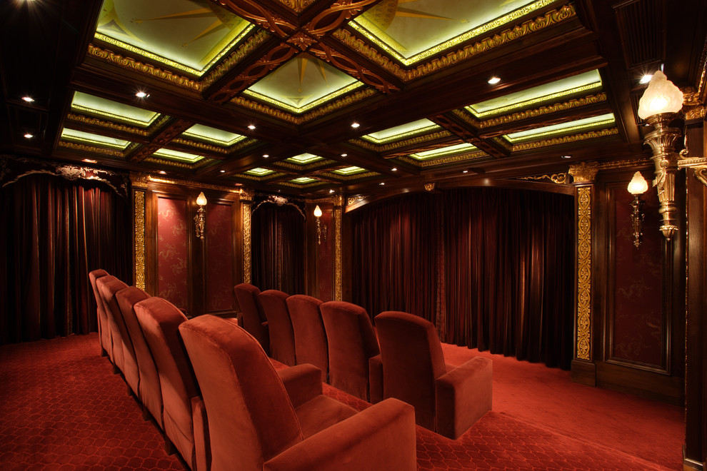 Photo of a classic home cinema in Austin with red floors.