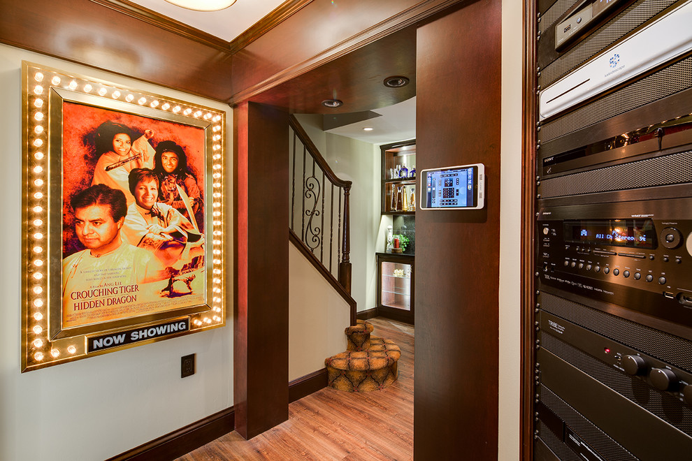 Photo of a medium sized classic enclosed home cinema in Baltimore with beige walls, carpet and a projector screen.