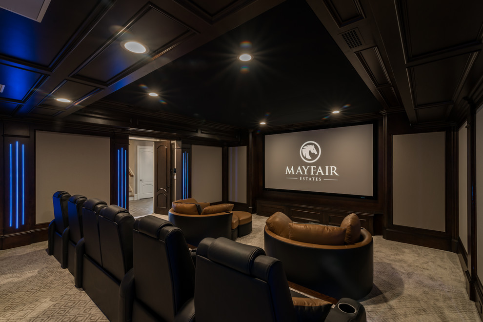 Photo of a large classic enclosed home cinema in Atlanta with beige walls, carpet, a projector screen and beige floors.