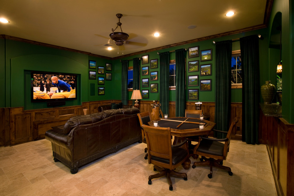 Mid-sized elegant enclosed porcelain tile home theater photo in Austin with a wall-mounted tv and green walls