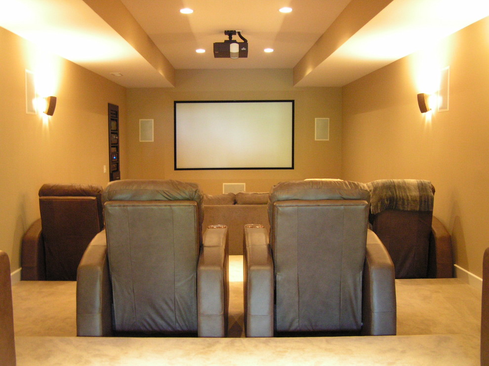 Inspiration for a contemporary home theater remodel in St Louis