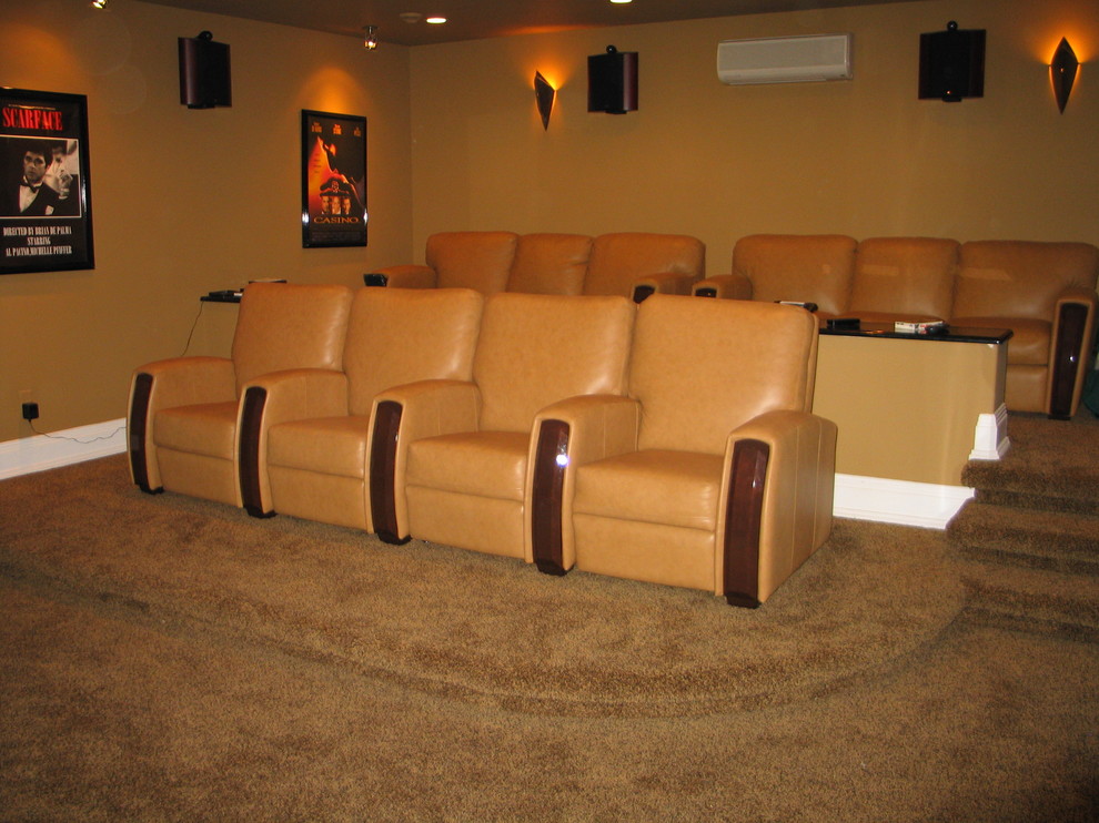 Example of a mid-sized classic enclosed carpeted and brown floor home theater design in Toronto with brown walls