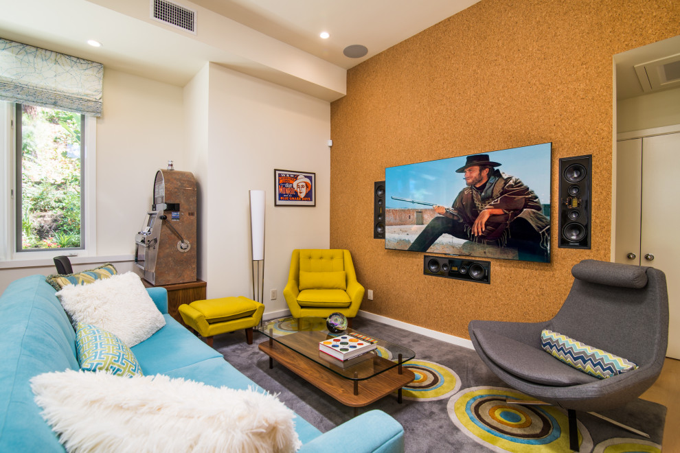 Design ideas for a retro enclosed home cinema in Los Angeles with white walls, a wall mounted tv and a feature wall.