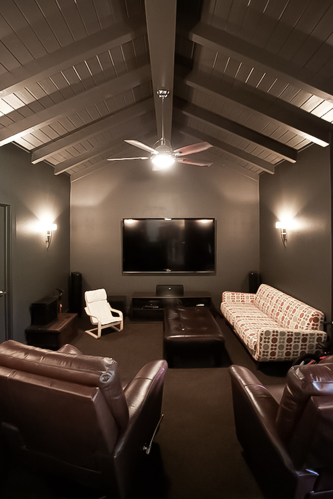 Photo of a midcentury home cinema in Dallas.