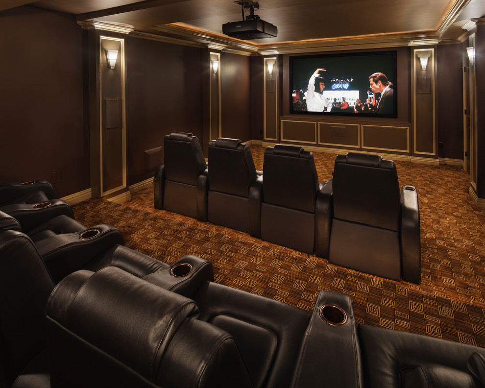 This is an example of a large classic enclosed home cinema in New York with brown floors, brown walls, carpet and a projector screen.
