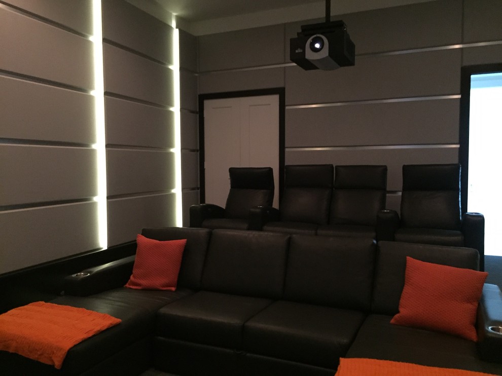 Photo of a modern home cinema in Miami.