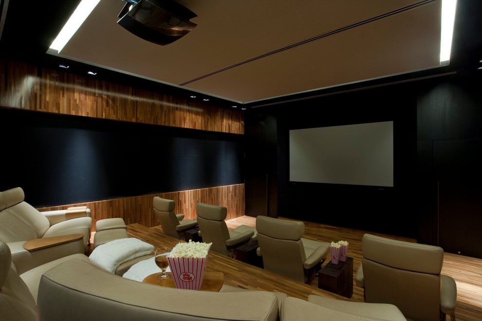 Inspiration for a tropical home theater remodel in Other
