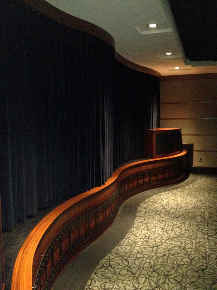 Example of a trendy home theater design in Charlotte