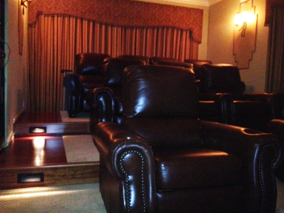 Example of a mid-sized classic home theater design in Miami