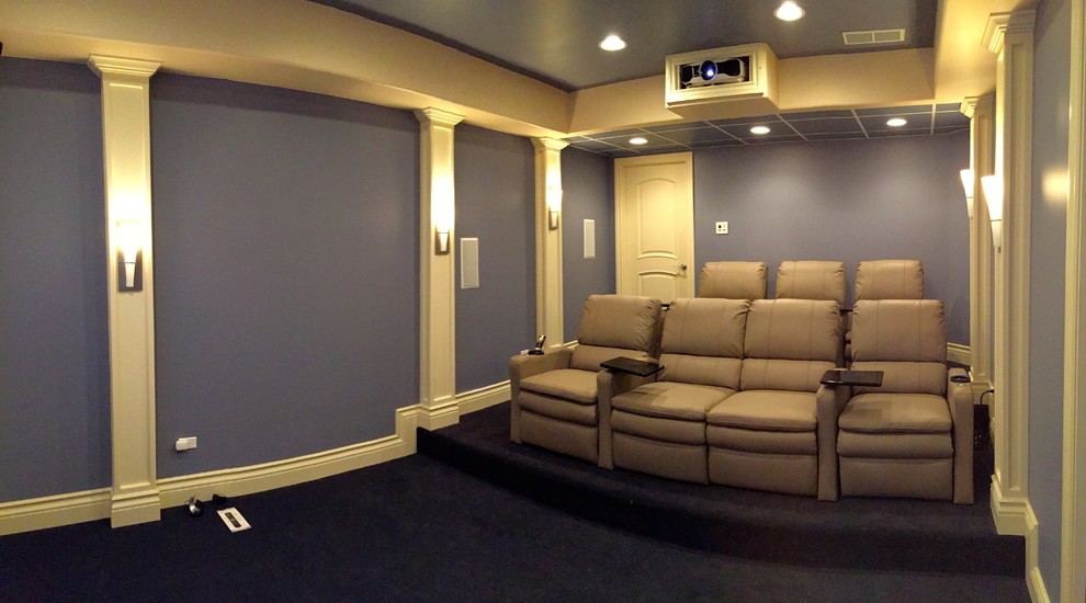 Example of a mid-sized classic enclosed carpeted home theater design in Chicago with purple walls and a projector screen