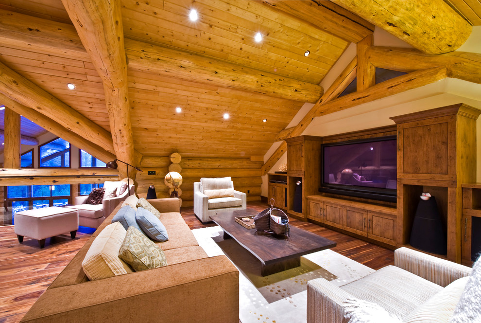 This is an example of a rustic home cinema in Calgary.
