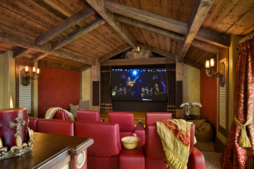 Inspiration for a rustic home cinema in Other with red walls.