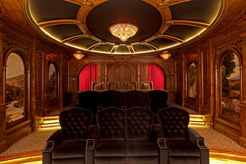 Photo of a large rustic enclosed home cinema in Minneapolis with a projector screen.