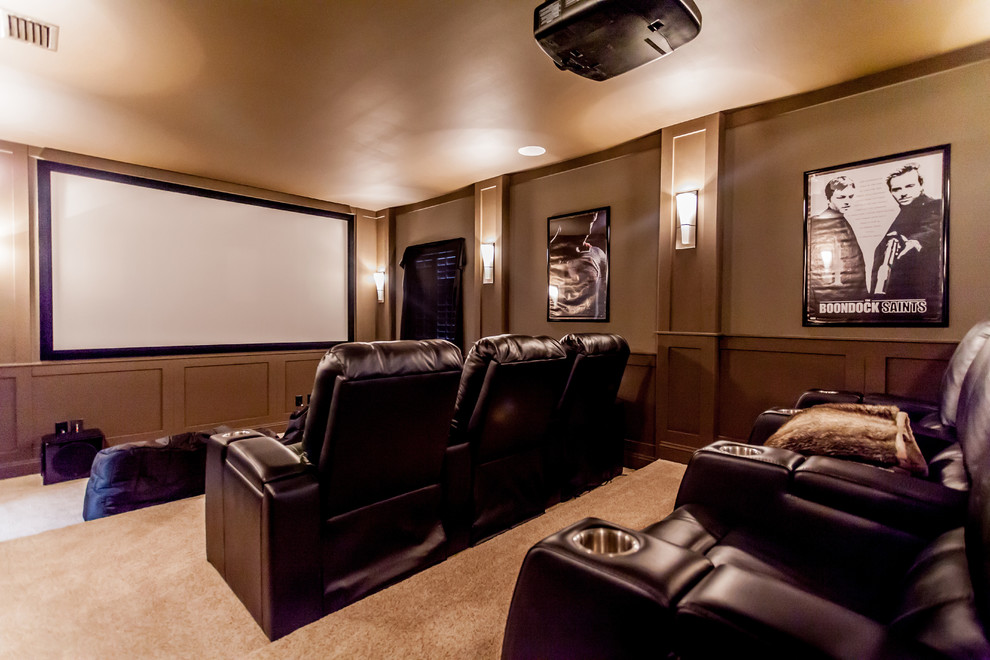 Design ideas for a large mediterranean enclosed home cinema in Jacksonville with brown walls, carpet and a projector screen.