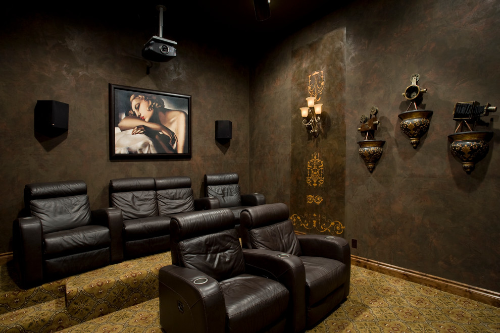 Tuscan carpeted home theater photo in Austin with a projector screen