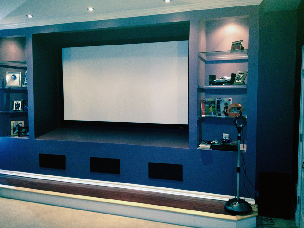 Inspiration for a contemporary home cinema in Raleigh.