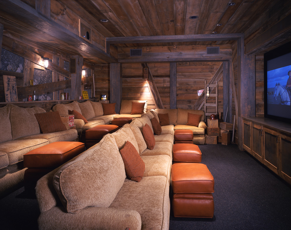 Design ideas for a rustic home cinema in Denver with carpet, a projector screen and black floors.