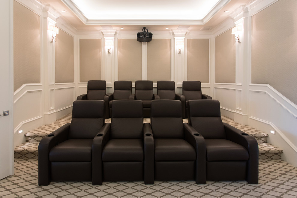 Design ideas for a medium sized classic enclosed home cinema in San Diego with beige walls, carpet, a projector screen and beige floors.