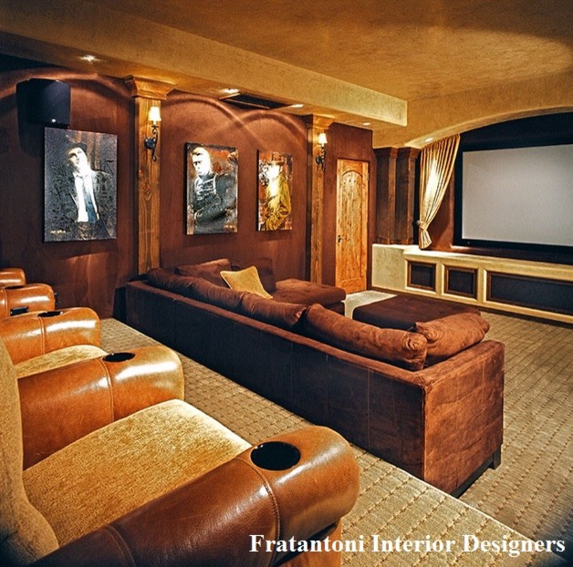 Inspiration for a huge mediterranean enclosed carpeted home theater remodel in Phoenix with red walls and a projector screen