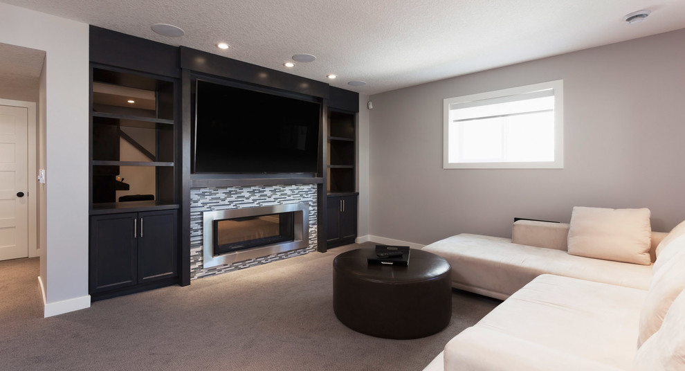 This is an example of a contemporary home cinema in Calgary.