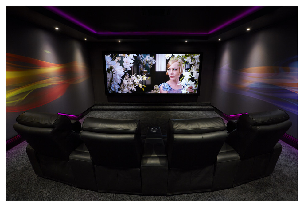 Photo of a contemporary home cinema in West Midlands.
