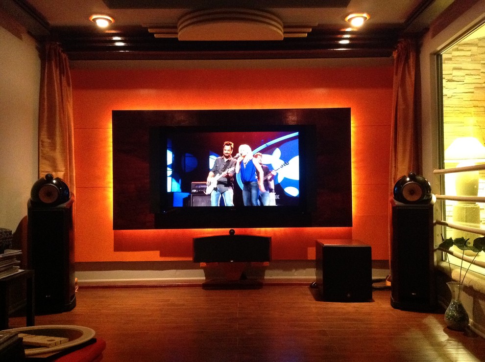 This is an example of a contemporary home cinema in Los Angeles.
