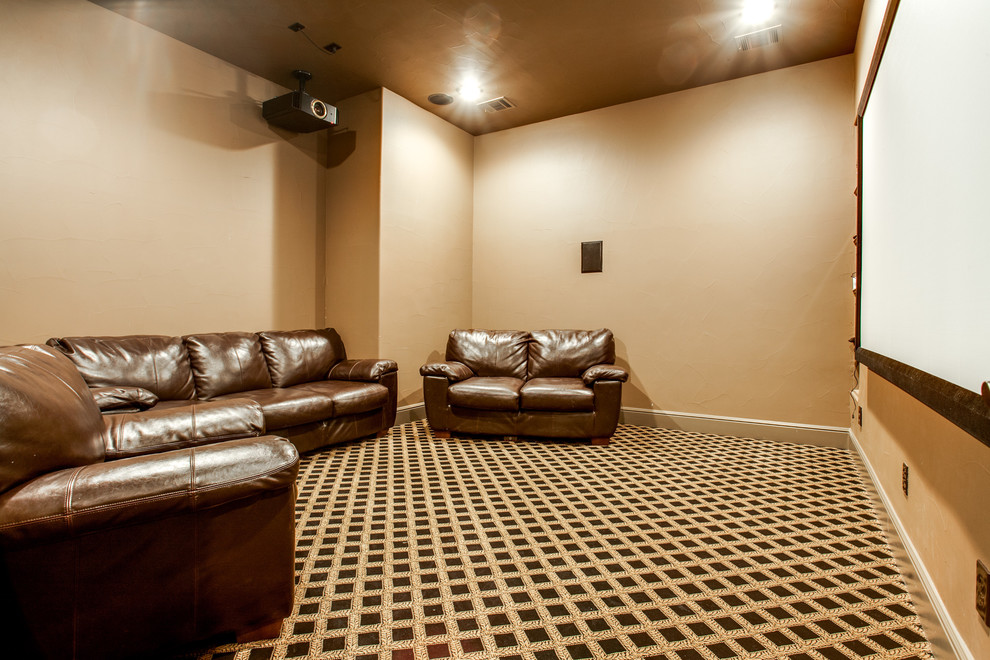 Design ideas for a medium sized traditional enclosed home cinema in Dallas with beige walls, carpet, a projector screen and multi-coloured floors.