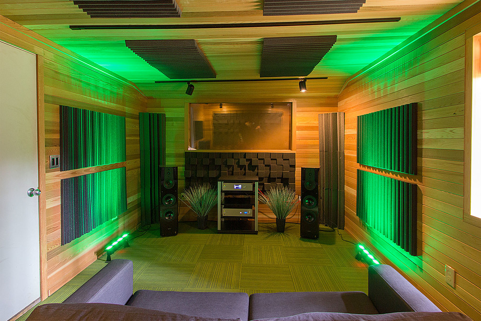 This is an example of a medium sized farmhouse home cinema in New York.