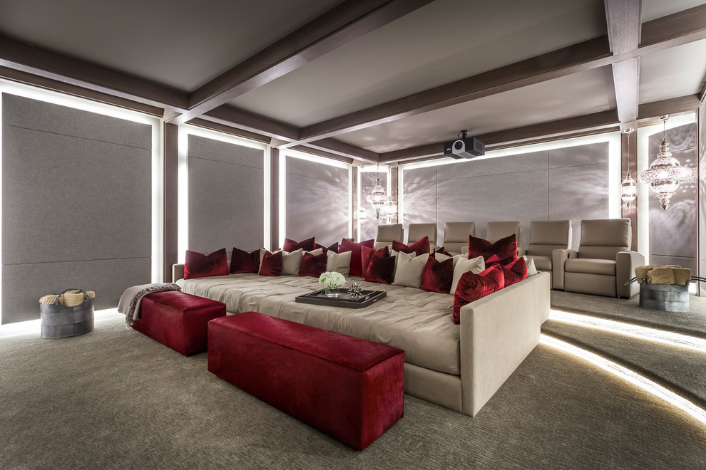 Photo of a large contemporary enclosed home cinema in New York with grey walls, carpet, a projector screen and grey floors.